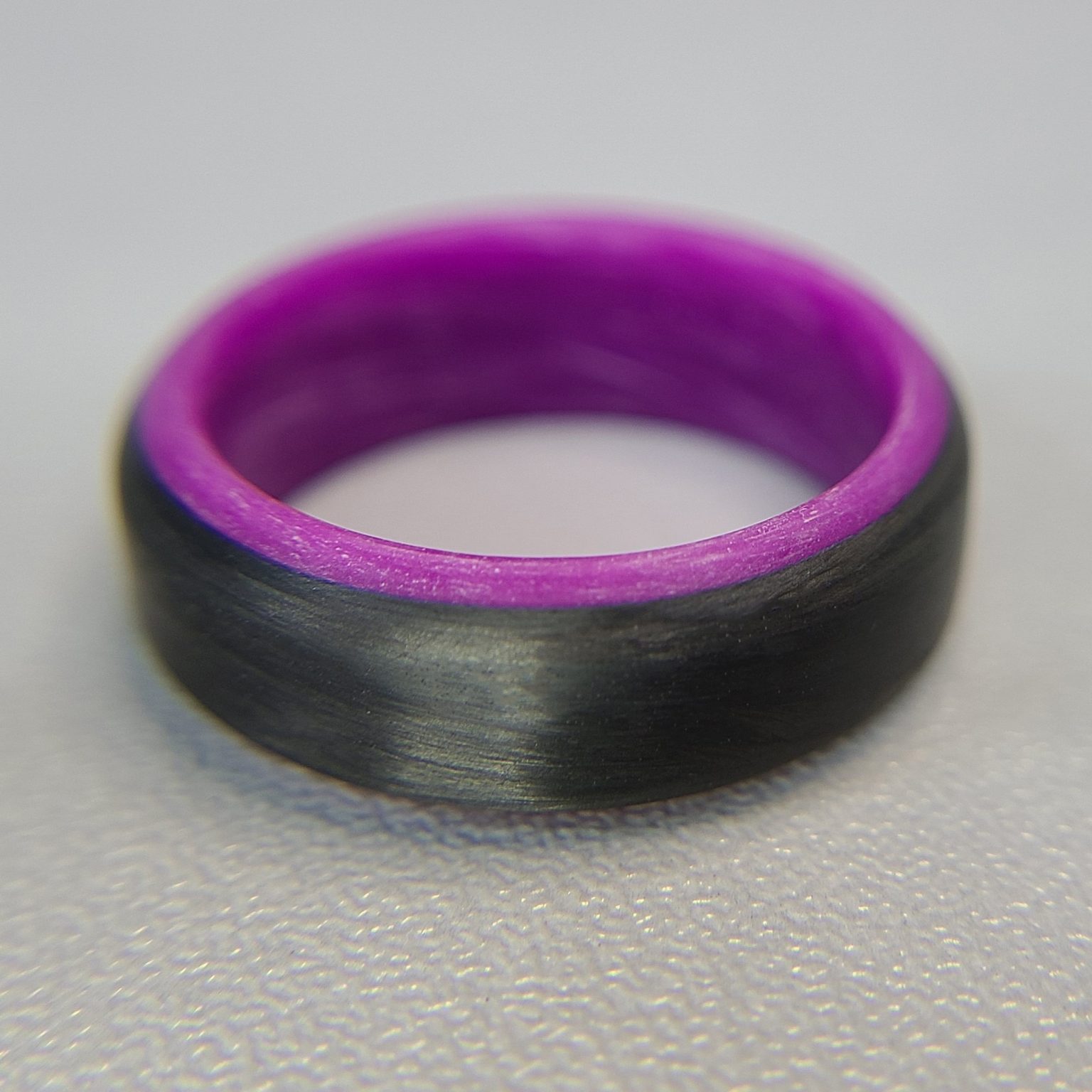 Carbon Fiber Ring with Purple Glowing Interior CORE CARBON RINGS