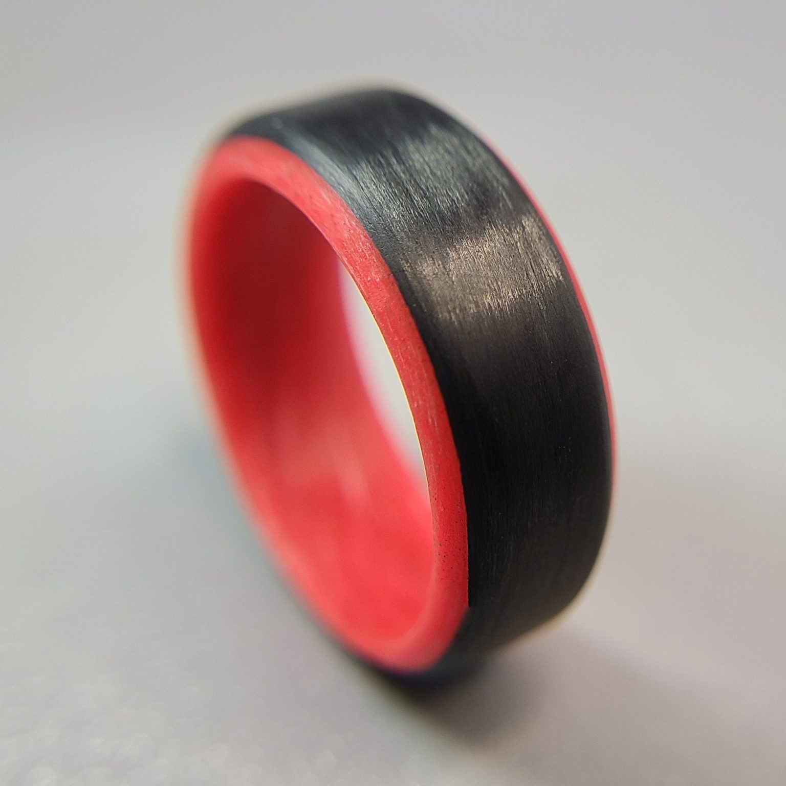 Carbon Fiber Ring with Red Glowing Interior CORE CARBON RINGS
