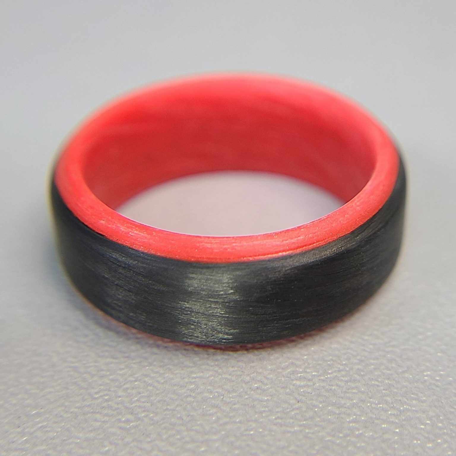 Carbon Fiber Ring with Red Glowing Interior CORE CARBON RINGS